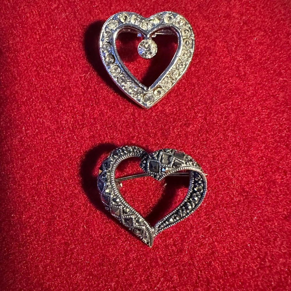 Vintage heart pins. One sterling silver & marcasite, the other rhinestones.